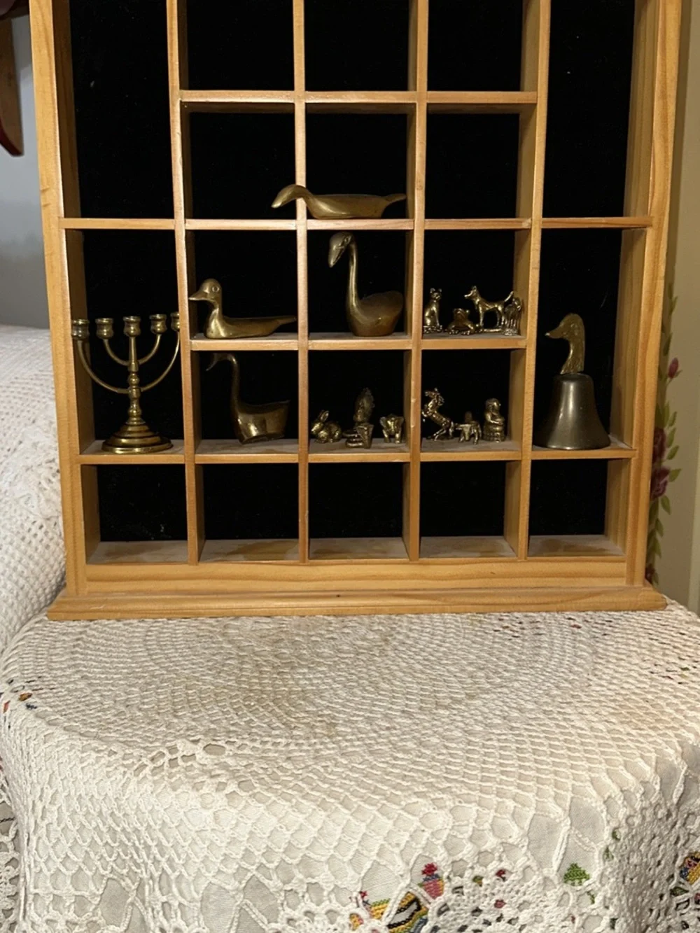 Wooden Grid Display Shelf Wall Decor in Natural Pine &brass figurines
